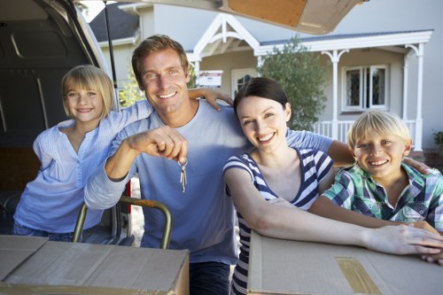 Residential moving team loading furniture in Enfield